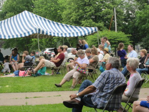 Photo of attendees enjoying outdoor concert at the Chocolate Stroll