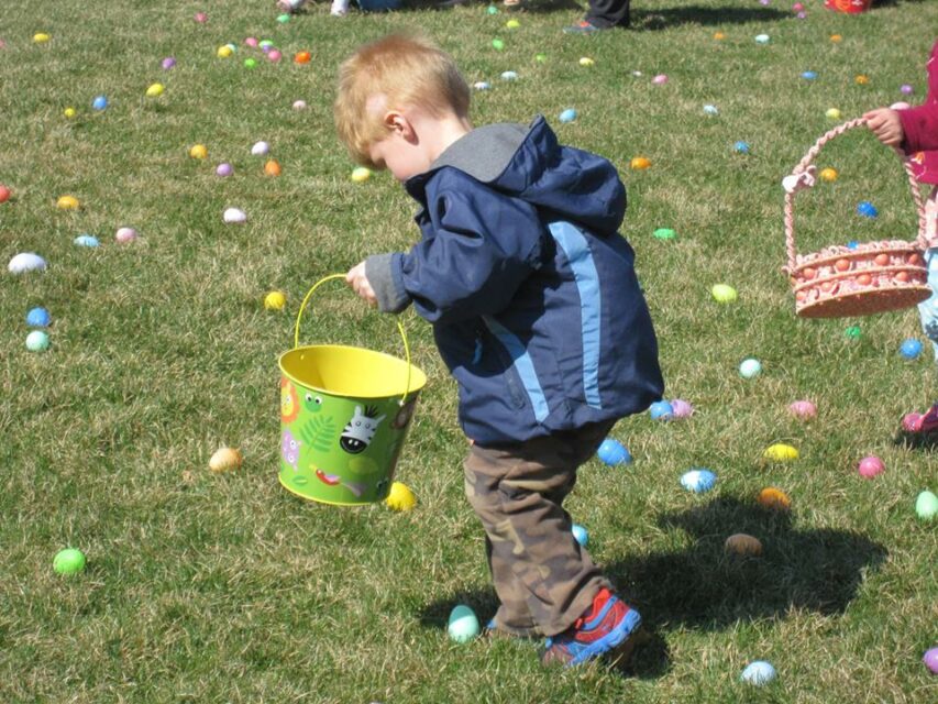 Boy collecting Easter Eggs at the Easter Egg Dash 2015