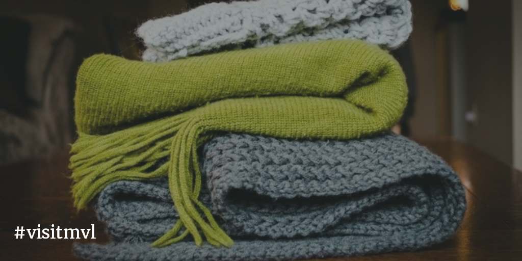 Stack of knit scarves