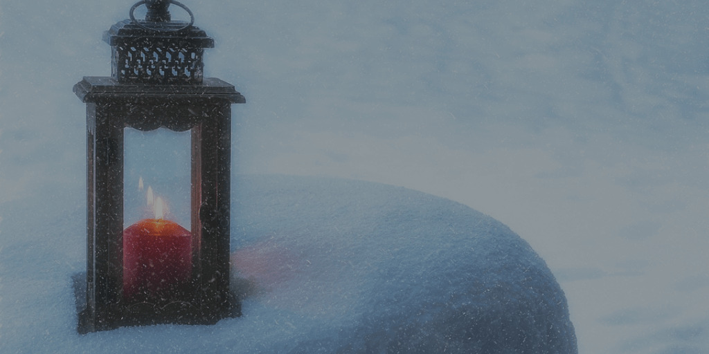 Red Candle in Latern with Snow