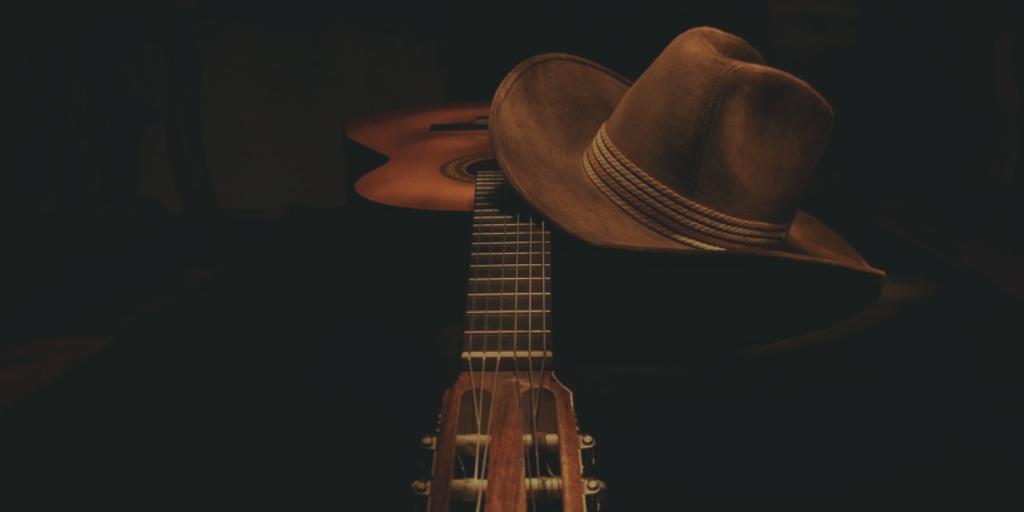 guitar and cowboy hat