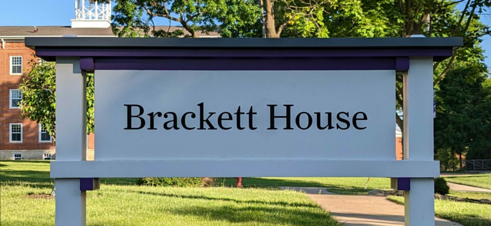 wooden sign for "Brackett House"