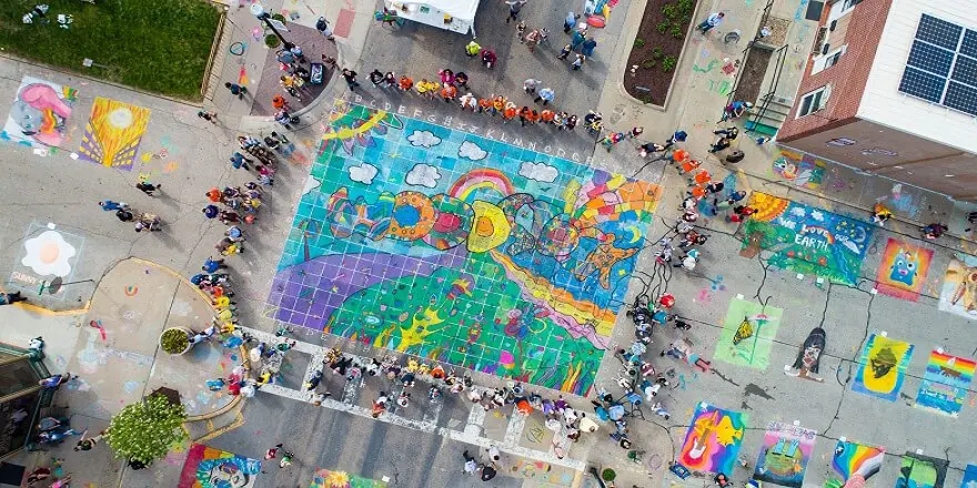 photo of the Woodstock artwork in chalk the walk 2022