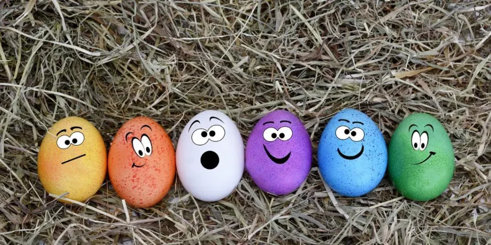decorated painted Easter eggs with faces