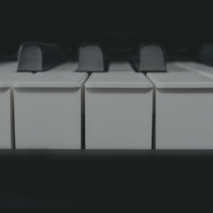 Close up of end of piano keys