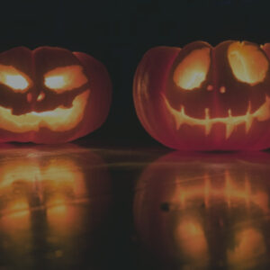 2 Jack-O-Lanterns lit up for Halloween
