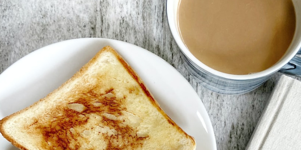 plate of toast with cup of coffee