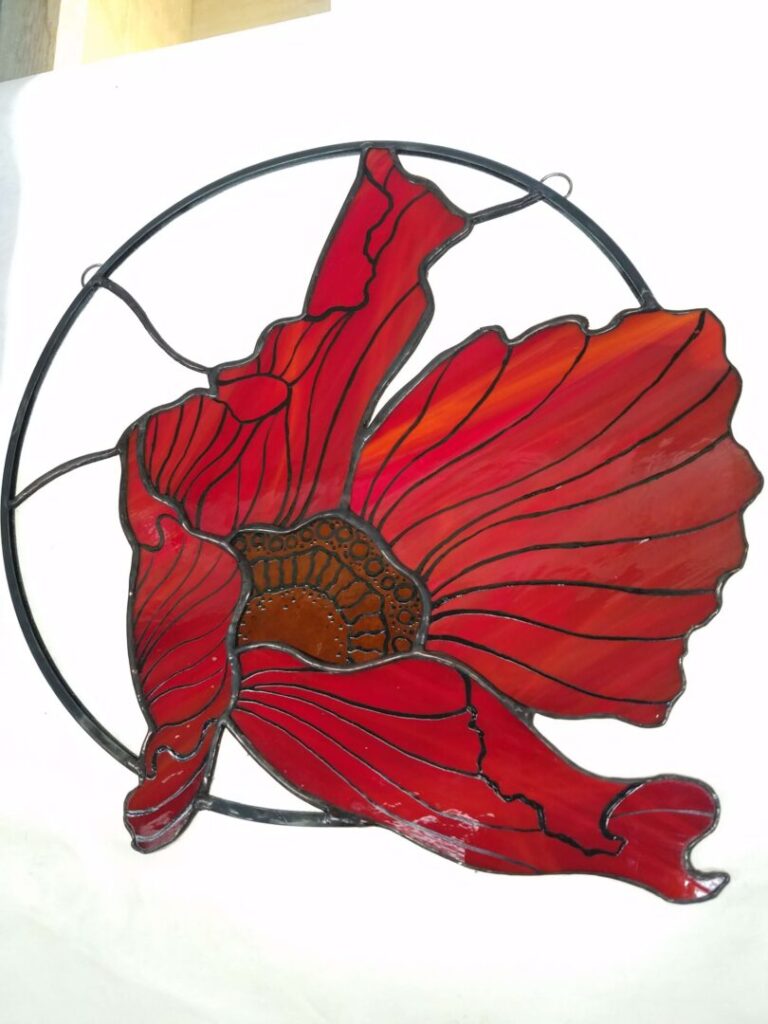 Red flower reaching out of circle frame 768x1024